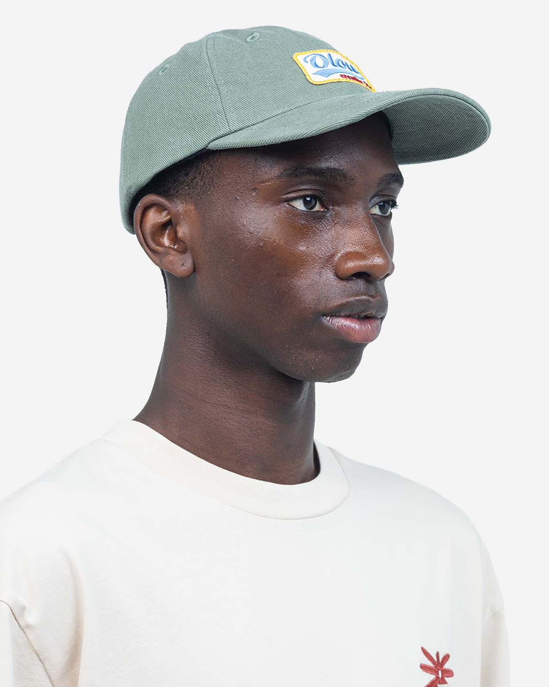 Casquette Six Panel Cartlon Vert Olive OLOW en coton biologique vert olive, coupe six panel, visière courbée