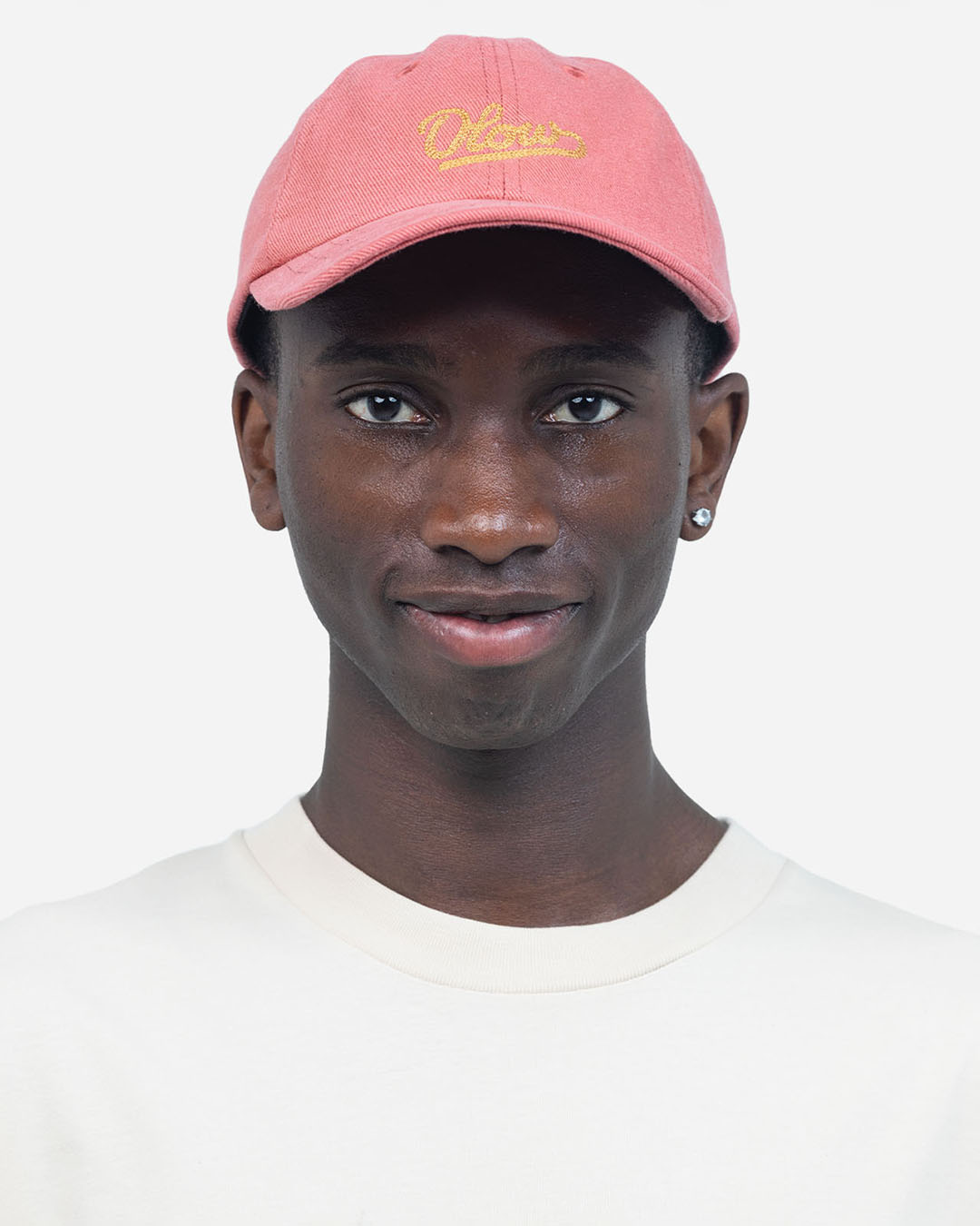 Casquette Six Panel Signature Rose Minéral OLOW en coton biologique rose, coupe six panel, visière courbée